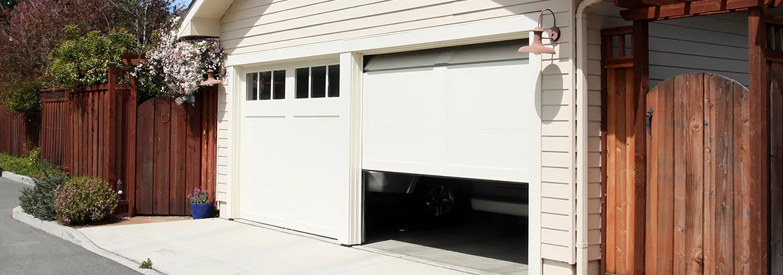 Fix Metal Garage Door Jerking in North Miami, Florida